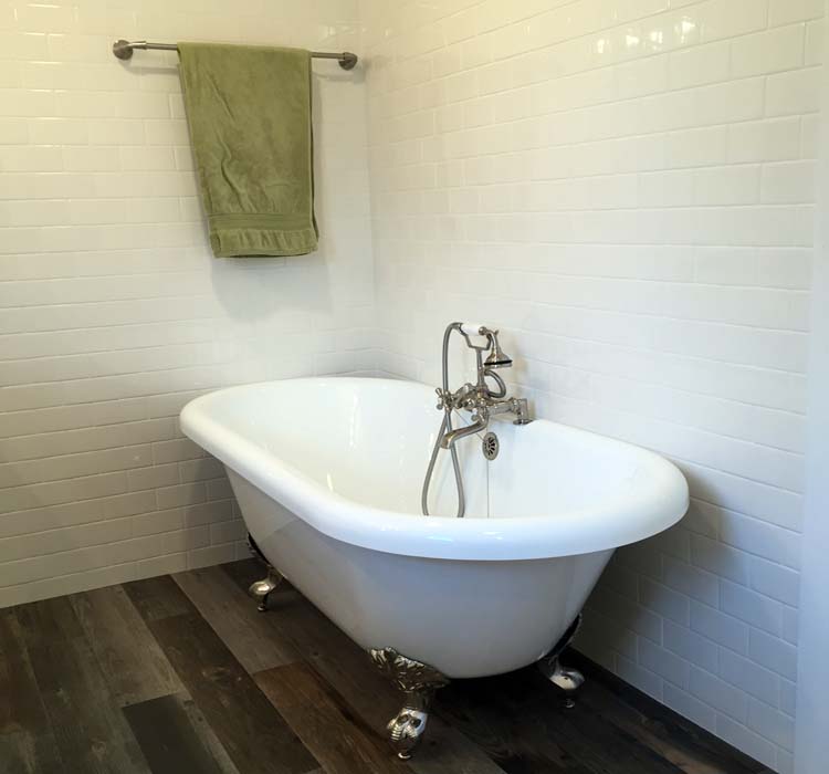 Tile Specialist Claw Foot Tub Bathroom Remodel Wood-Look Tile Floor Installation